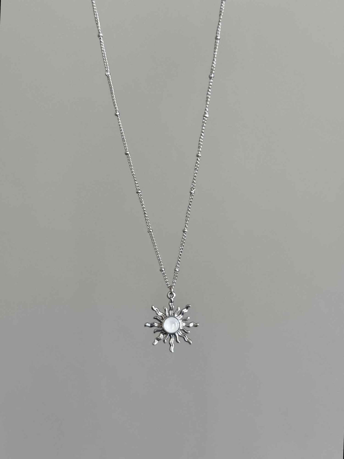 Silver stone sun necklace