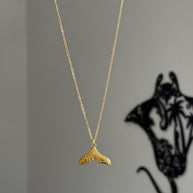 Stylized fin necklace (gold/silver)
